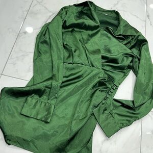 This emerald green mini dress will be sure to turn heads!